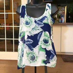 M. C.Flowy floral sleeves blouse with a T-strap in the back. Size L